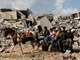 Des Palestiniens constatant les dégâts à Jabalia, dans le nord de Gaza, le 18 janvier 2009.(Photo : Reuters)