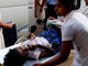 Une jeune victime arrive à l'hôpital de Vavuniya situé à environ 260 kilomètres de la capitale Colombo, le 22 janvier 2009.(Photo: Reuters)