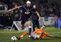 Fernando Menegazzo souffre face à Laurent Battles.(Photo : Reuters)