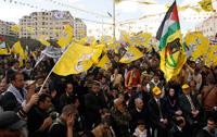 Des Palestiniens du Fatah manifestent à Naplouse, en Cisjordanie, le 25 février 2009.(Photo : Reuters)