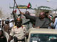 Le président soudanais Omar el-Béchir (c)  à El-Facher, le 8 mars 2009, lors de sa première visite au Darfour depuis la délivrance d'un mandat d'arrêt international par la CPI. (Photo : Reuters)
