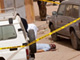 Déploiement policier autour du corps de l'Américain tué par balles, dans le centre de Nouakchott, le 23 juin 2009.(Photo : AFP)