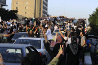 La mobilisation des partisans de Mir Hossein Moussavi  ne faiblit pas dans les rues de Téhéran en ce 18 juin 2009.(Photo : Reuters)
