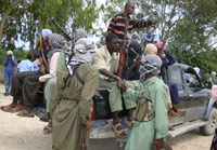 Des islamistes radicaux d'al-Chabaab au sud-ouest de Mogadischio le 22 juin, où les combats se sont intensifiés.(Photo : Omar Faruki/Reuters)