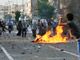 Affrontements entre policiers et partisans de Mir Hossein Moussavi, dans les rues de Téhéran, le 20 juin 2009.(Photo : Reuters)