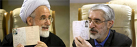 Mehdi Karoubi&nbsp;(g) et Mir Hossein Moussavi, les deux candidats malheureux à l’élection présidentielle du 12&nbsp;juin 2009.(Photo : Morteza Nikoubazl/Reuters)