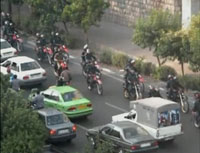 La police anti-émeutes dans les rues Téhéran, le 30 juillet 2009.(Photo: Reuters / YouTube)