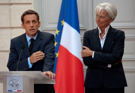 Nicolas Sarkozy et Christine Lagarde lors de la conférence de presse du 25 août 2009.(Photo: Reuters)