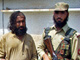 Maulvi Omar, principal porte-parole des talibans pakistanais, lors de son arrestation, le 18 août 2009.(Photo : AFP)