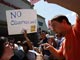 Des américains contestent la réforme sur la santé proposée le 8 Août 2009.(Photo : AFP)