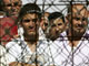 Des prisonniers irakiens dans la prison d'Abou Ghraib en janvier 2006.(Photo: Ali Jasim / AFP)