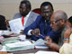 Des membres de la Cour constitutionnelle présents lors du début du recomptage des voix, à Libreville, le 30 septembre.(Photo : Yanick Maniengui/AFP)