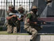 Les soldats prennent position à l'extérieur du quartier général de l'armée pakistanaise pris d'assaut par des hommes armés, à Rawalpindi, en périphérie d'Islamabad, le 10 octobre.(Photo : Faisal Mahmood/Reuters)