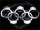 Олимпийские кольца в виде наручников (кампания "Репортеров без границ" за свободу печати в КНР)(Photo : rsf.org)