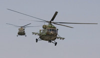 Российский военный вертолет доставляет грузинских пленных для обмена на задержанных российских солдат. 19 августа 2008. Район села Капси на дороге из Гори в Тбилиси.(Photo: Reuters)