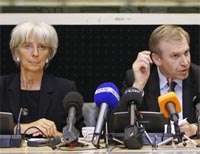 Министр экономики и финансов Франции Кристин Лагард и премьер-министр Бельгии Ив Летерм на пресс-конференции, посвященной рефинансированию банка Dexia, 9 октября 2008.(Photo: Reuters)