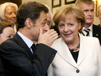 Президент Франции Николя Саркози и канцлер Германии Ангела Меркель во время пресс-конференции в Лондоне, 1 апреля 2009. REUTERS/Philippe Wojazer
