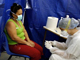 Анализ на наличие вируса гриппа А в медицинском центре города Нумеа, французская Новая Каледония.(Photo : AFP)
