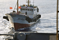 Tàu Trung Quốc quấy nhiễu tàu Mỹ ngày 8/3 ở vùng biển Đông.Photo: Reuters