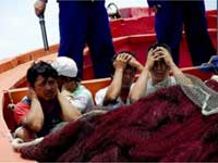 Ngư dân Việt Nam bị Trung Quốc bắt giữ(Ảnh : DR)