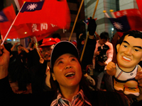 Partisans du Kuomintang dans les rues de Taipei, le 12 janvier 08.( Photo : Reuters )