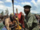 Le jeune frère de Laurent Nkunda, le capitaine Seco, danse dans le stade de Rutshuru, le 1er novembre 2008.( Photo : AFP )