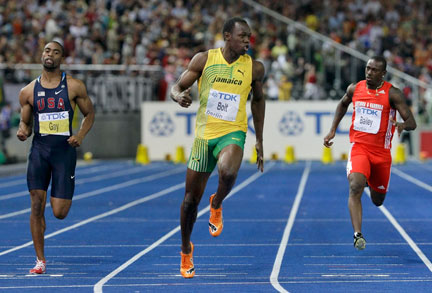 Le plus grand sprinteur de tous les temps devant Tyson Gay (g) et Daniel Bailey (d), respectivement deuxième et quatrième.(Photo: Reuters)